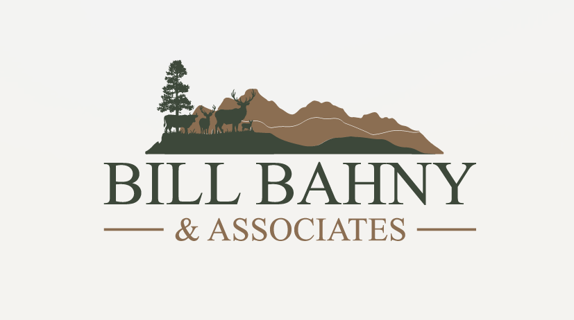 Logo for Bill Bahny & Associates featuring silhouettes of elk, a tree, and distant mountains above the company name—ideal for showcasing Montana ranches, with Bill Bahny in large dark green text and & Associates in smaller brown text below.